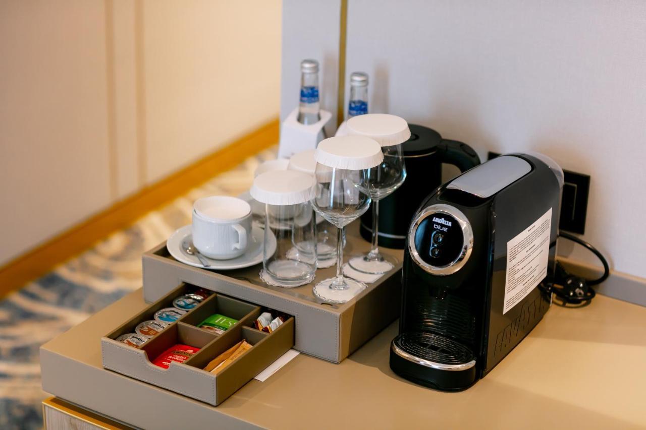 Intercontinental Baku By Ihg Hotel Exterior photo A Nespresso coffee machine in a hotel room